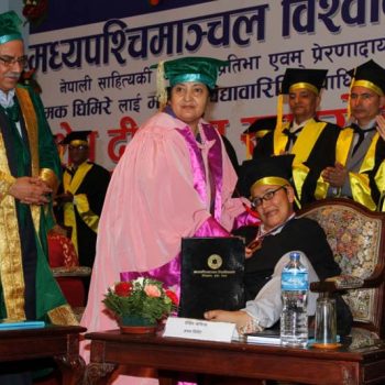 President Bidya Devi Bhandari confers the honorary PhD degree on writer Jhamak Kumari Ghimire, who is struggling with cerebral palsy, at a special convocation ceremony of Mid-Western University, in Kathmandu, on Monday, September 5, 2016.